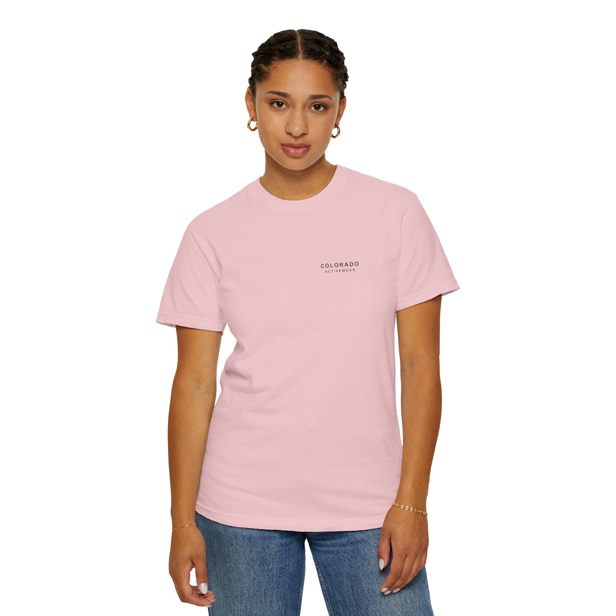 Blossom After the Summit Camp Mug Tee shown on a woman, front chest signature; illustrative styling mockup.