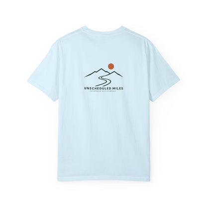 Back view of the Chambray Unscheduled Miles Road Tee with its compact ridge, winding road and orange sun graphic.